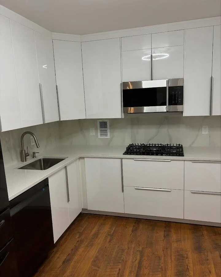 Restored kitchen with white cabinets after water damage in Kapolei